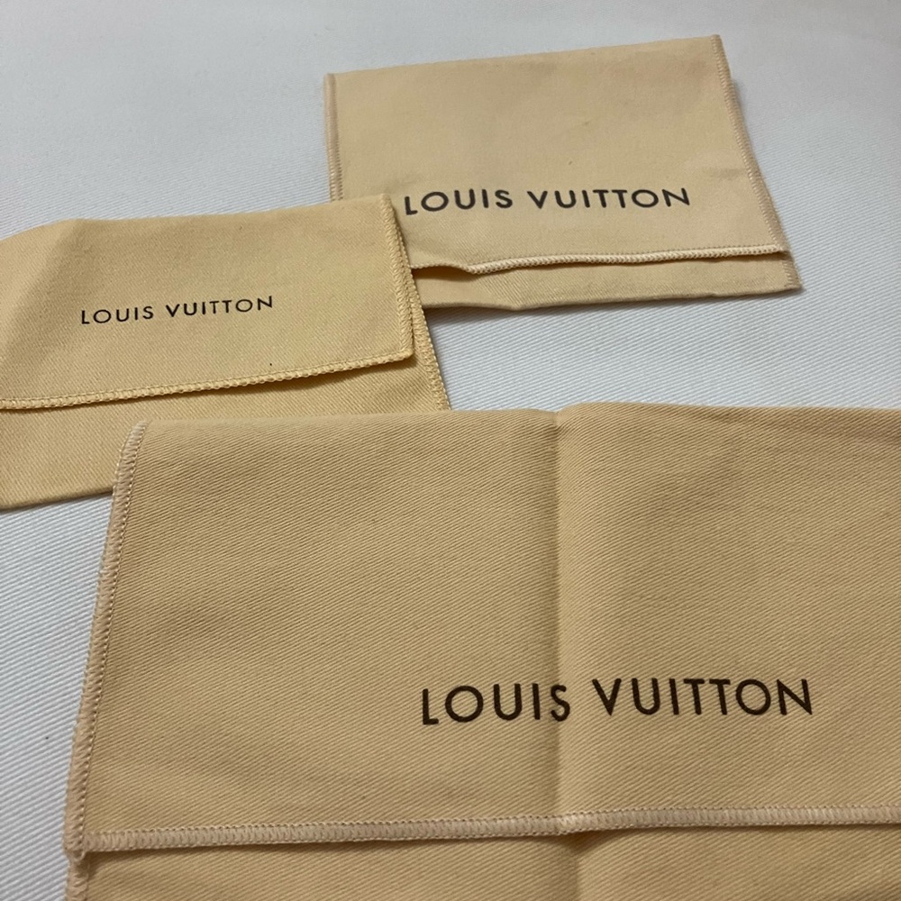 Authentic Louis Vuitton 3 dust bags.